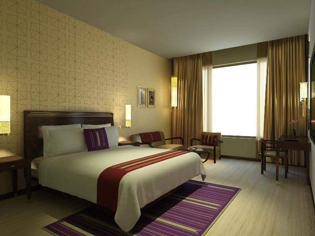 마라사 사로바 프리미어 호텔 티루파티 외부 사진 A typical room at the hotel