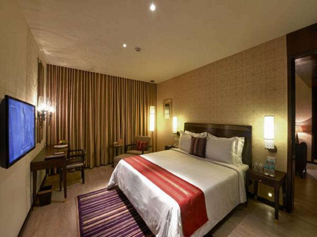 마라사 사로바 프리미어 호텔 티루파티 외부 사진 A room at the Taj Bengal